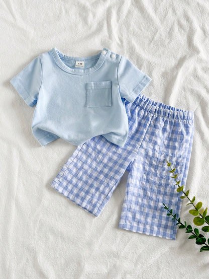 Prenda azul conjunto para bebe vista frontal con pantalón a cuadros