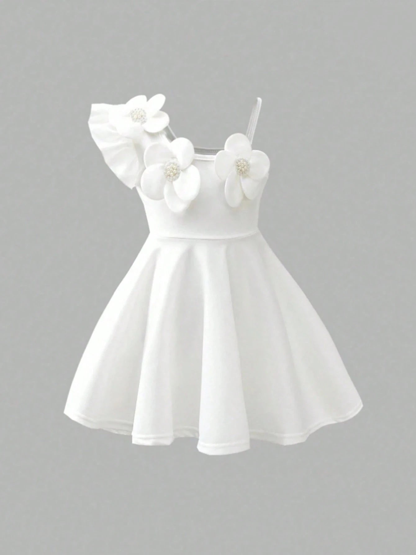 Prenda blanca vestido para bebe vista frontal con flores tridimensionales