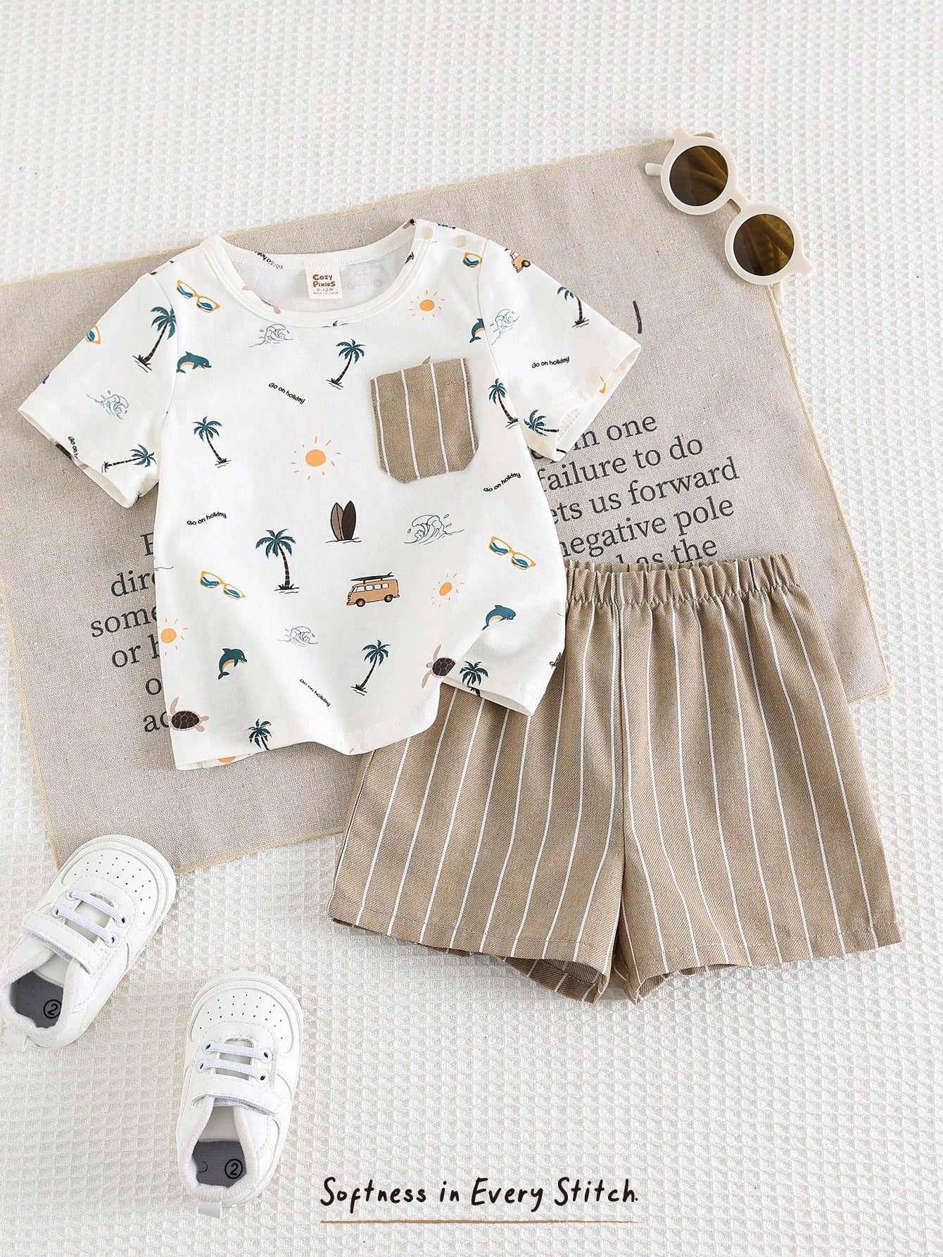 vista completa del conjunto con camiseta estampada y short a rayas