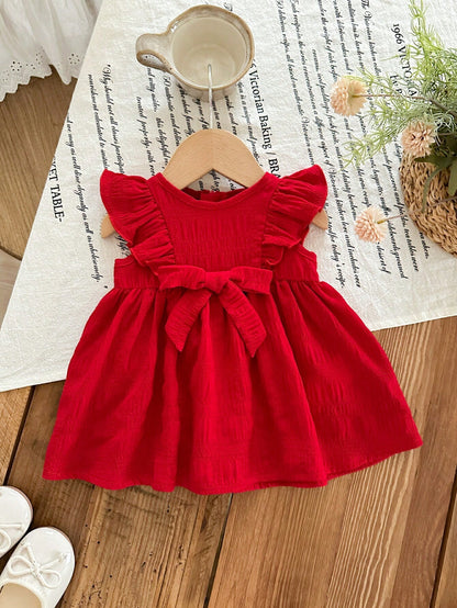 Prenda rojo vestido para bebe con detalle de lazo frontal