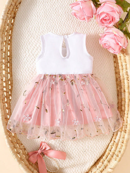 Prenda rosa coral vestido tul para bebe vista posterior
