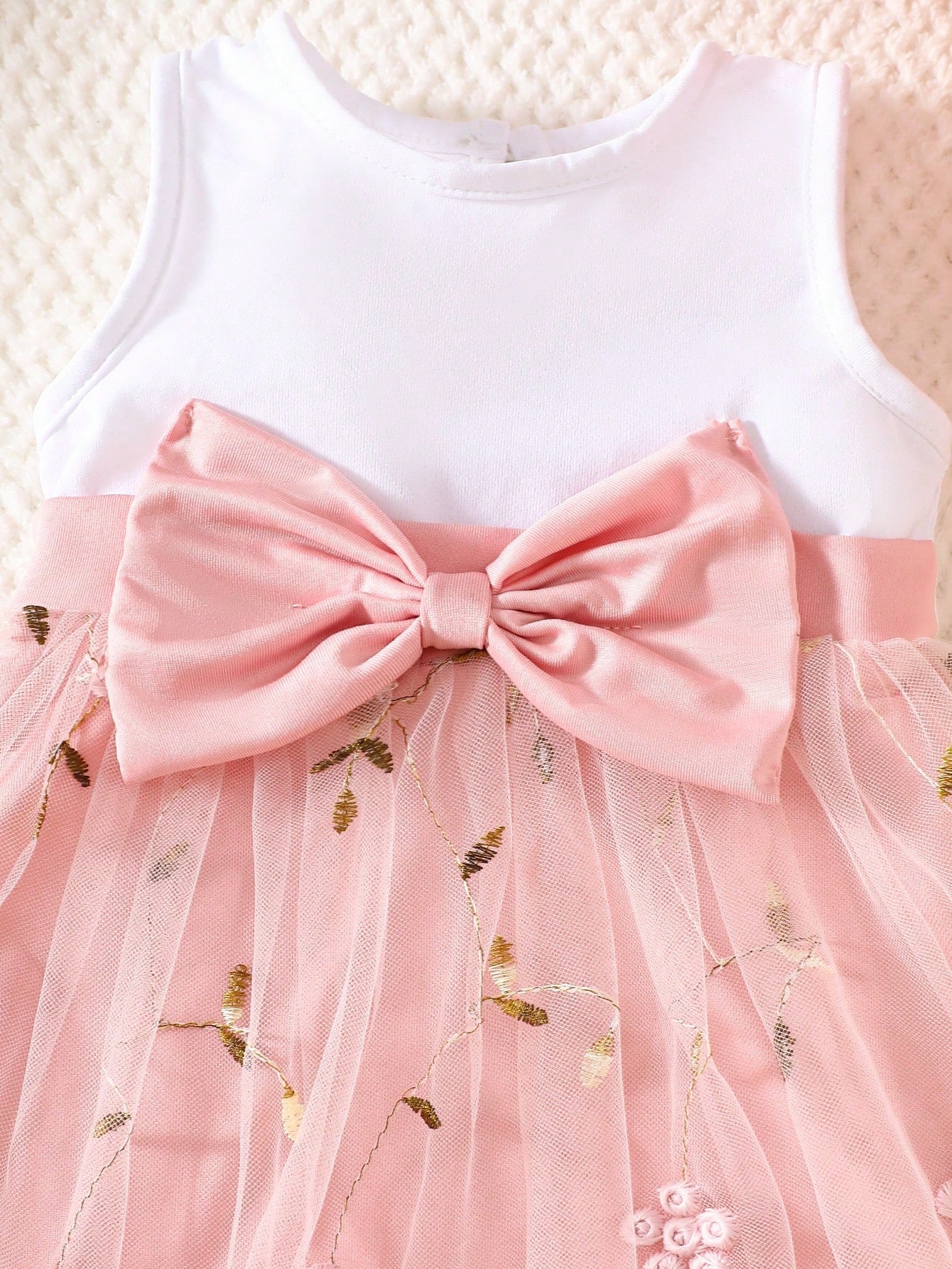 Prenda rosa coral vestido tul para bebe detalle de lazo y bordado
