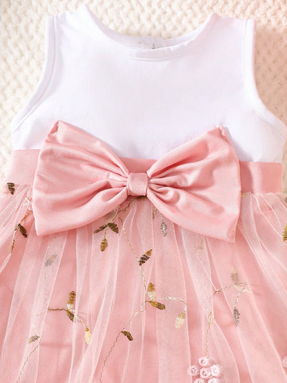 Prenda rosa coral vestido tul para bebe detalle de lazo y bordado
