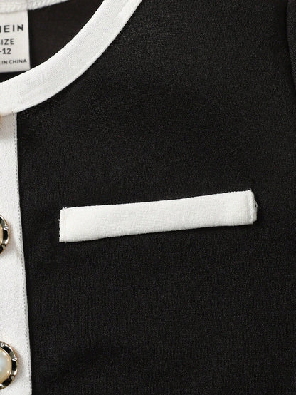 Prenda negro conjunto elegante para bebe detalle de bolsillo decorativo y acabado bicolor