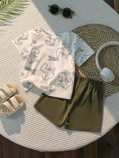 Prenda blanca conjunto para bebe con camiseta estampada y short verde vista trasera