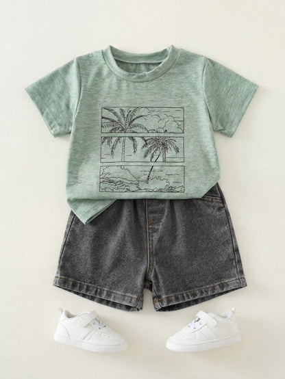 Prenda verde conjunto para bebe con camiseta estampada y shorts negros vista frontal