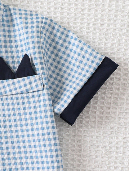 Prenda azul camisa para bebe con moño detalle de bolsillo
