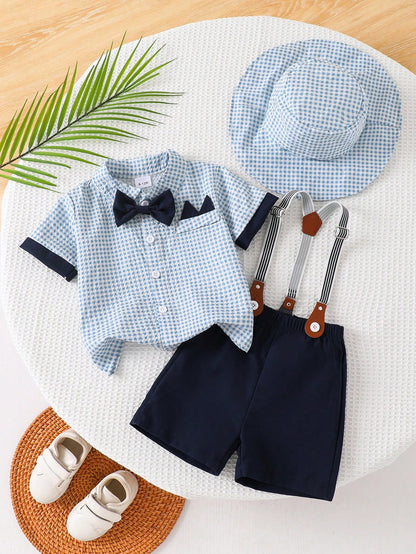 Prenda azul conjunto para bebe con tirantes y sombrero a cuadros vista frontal
