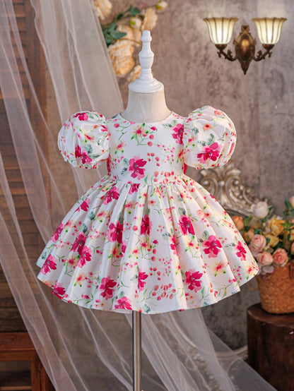 Prenda blanca vestido floral para bebe vista frontal con mangas abullonadas