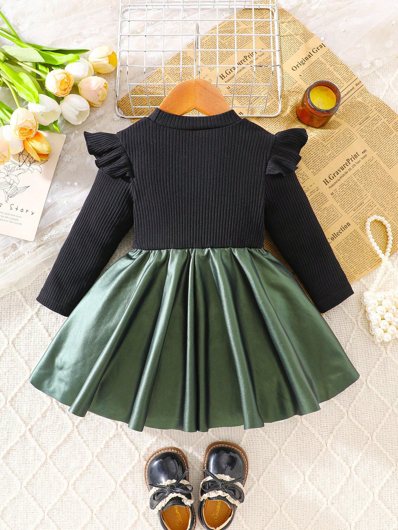 Prenda negro y verde vestido para bebe vista trasera con falda amplia