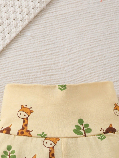 Prenda amarilla pantalón para bebe con estampado de jirafas y cintura elástica
