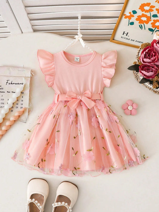 Prenda rosa vestido para bebe con tul bordado y lazo vista frontal
