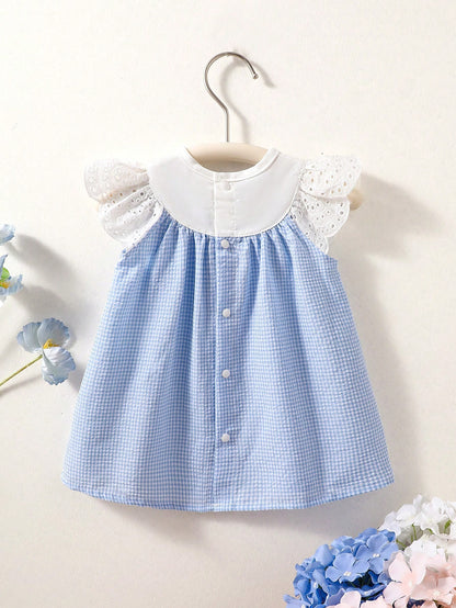 Prenda azul vestido para bebe a cuadros vista trasera