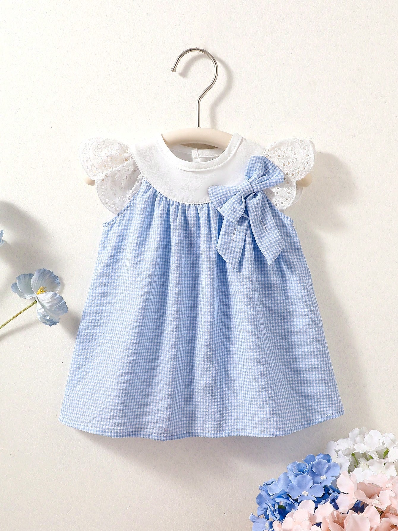 Prenda azul vestido para bebe a cuadros vista frontal