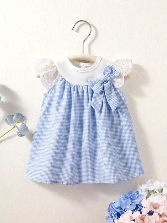 Prenda azul vestido para bebe a cuadros vista frontal