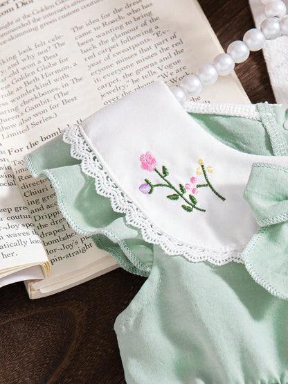 Prenda verde vestido para bebe detalle de cuello bordado
