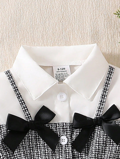 Prenda blanco y negro vestido para bebe detalle de cuello camisero y lazos