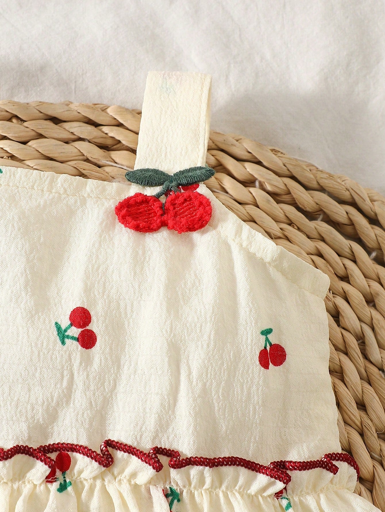 Prenda albaricoque top para bebe detalle de bordado 3D de cerezas