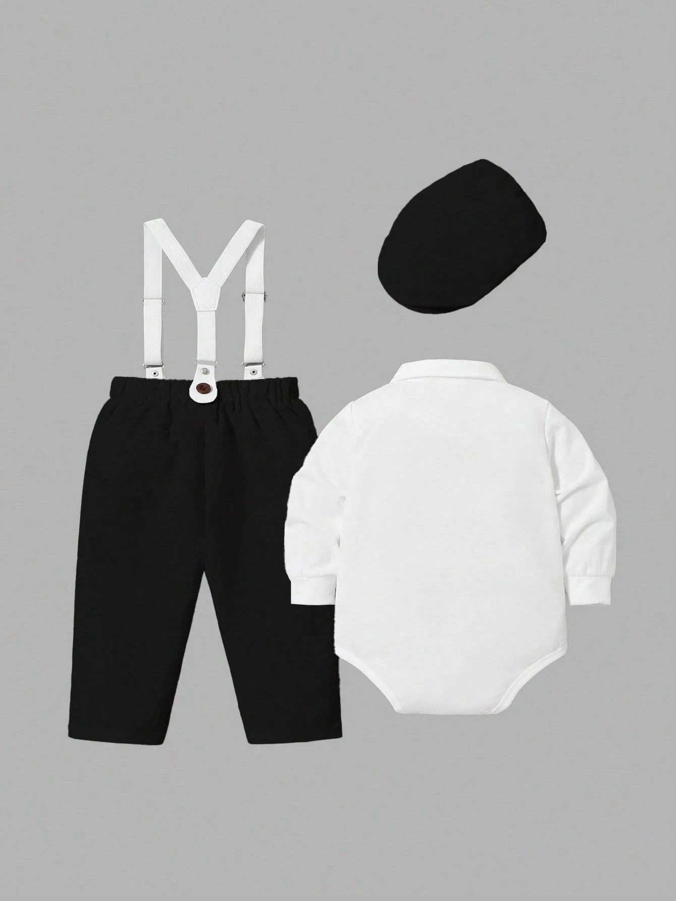 Prenda blanco negro conjunto para bebe con camisa y pantalón vista posterior

