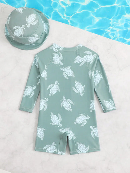 Prenda verde traje de baño para bebe con tortugas vista trasera