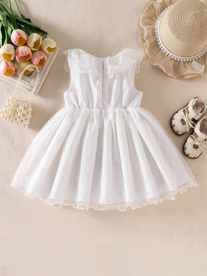 Prenda blanca vestido para bebe vista trasera con cierre