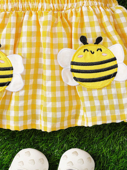 Prenda amarilla vestido para bebe detalle de abejas aplicadas