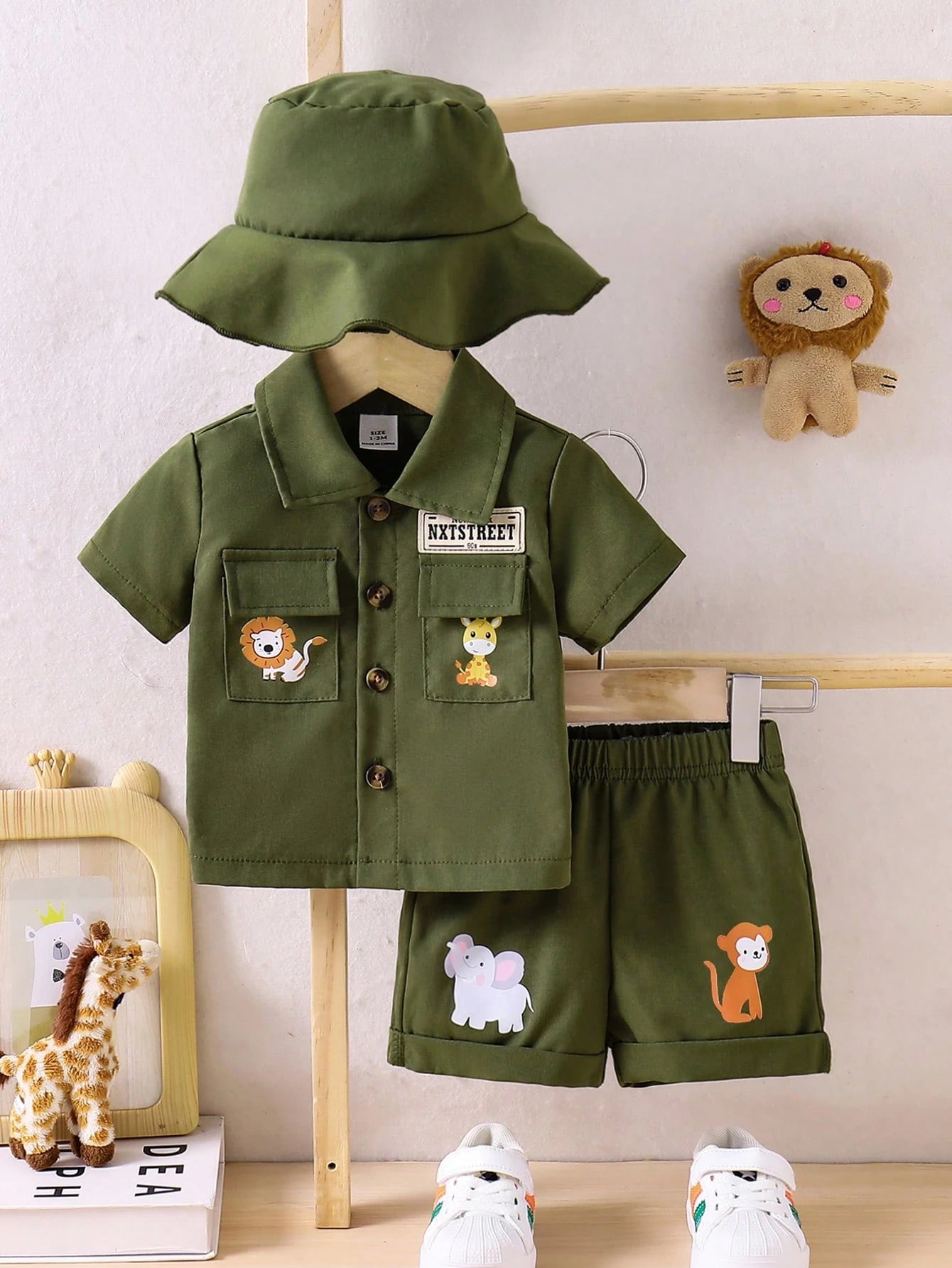 Prenda verde conjunto para bebe con gorro vista frontal