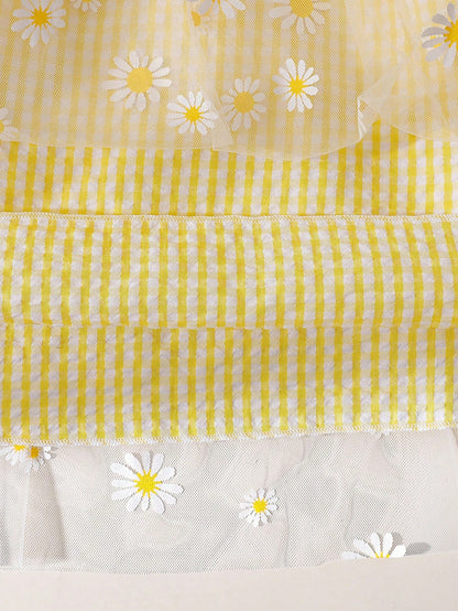 Prenda amarilla vestido para bebe con detalle de gasa estampada de margaritas