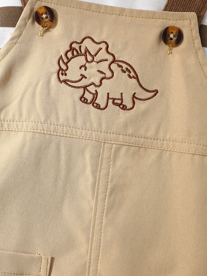 Prenda beige conjunto con overol para bebe y detalle de dinosaurio bordado