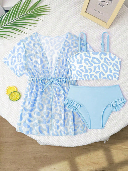 Prenda azul traje de baño para bebe de 3 piezas con salida estampada vista frontal