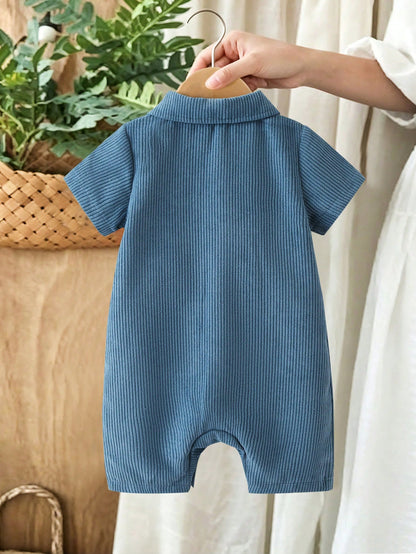 Prenda azul mameluco para bebe de manga corta vista trasera
