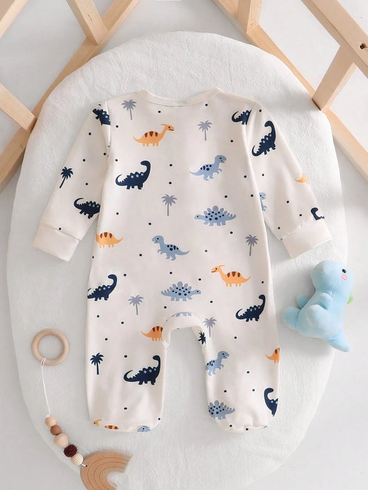 Prenda crema pelele para bebe con estampado de dinosaurios vista posterior
