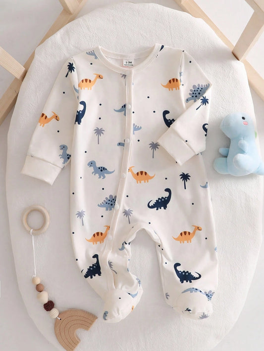 Prenda crema pelele para bebe con estampado de dinosaurios vista frontal
