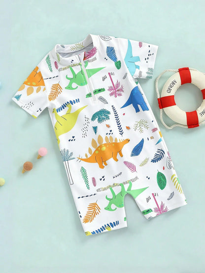 Prenda blanca traje de baño para bebe con dinosaurios coloridos vista frontal