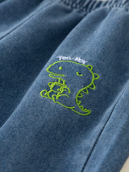 Prenda azul pantalón para bebe con detalle de dinosaurio bordado