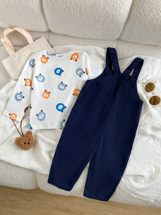Prenda azul marino conjunto para bebe con overol de tirantes y camiseta estampada vista trasera