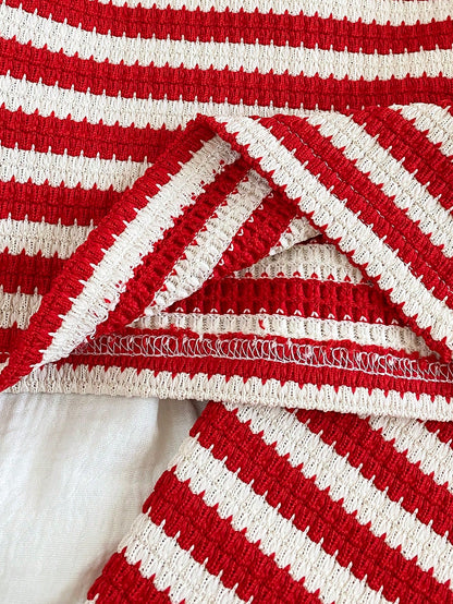 Prenda roja y blanca conjunto para bebe con detalle de costuras y acabado interior