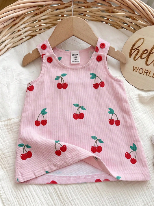 Prenda rosa vestido para bebe con estampado de cerezas vista frontal