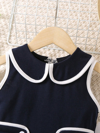 Vestido azul marino elegante con cuello peter pan