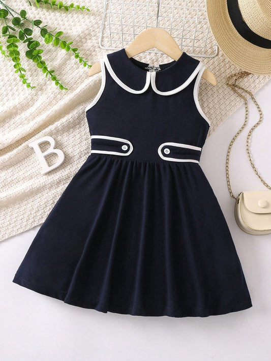 Vestido azul marino elegante con cuello peter pan