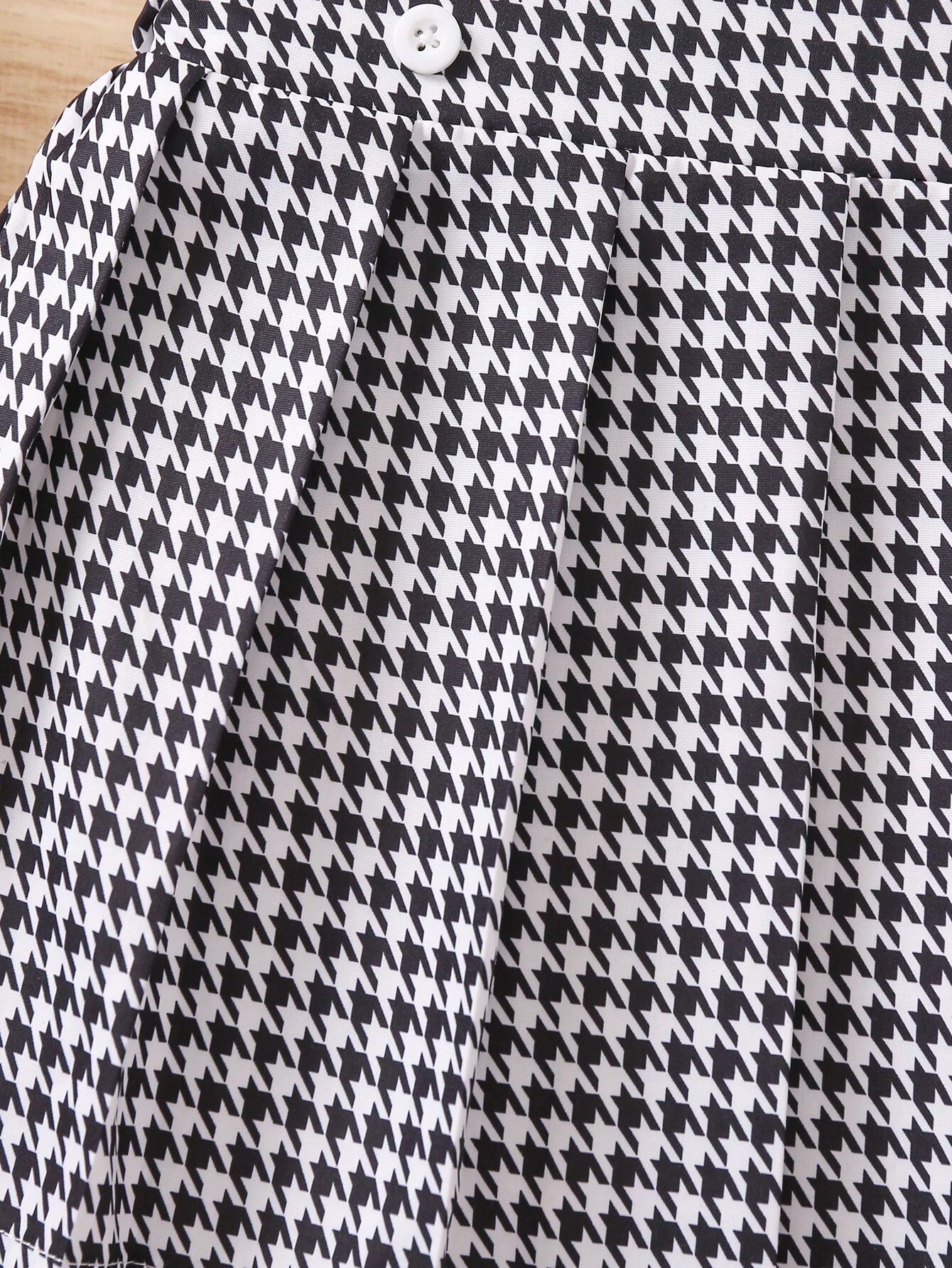 Prenda negro conjunto para bebe con top sin mangas cuello redondo