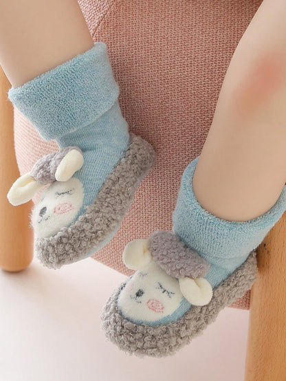 Calcetines antideslizantes azul con ovejita de peluche