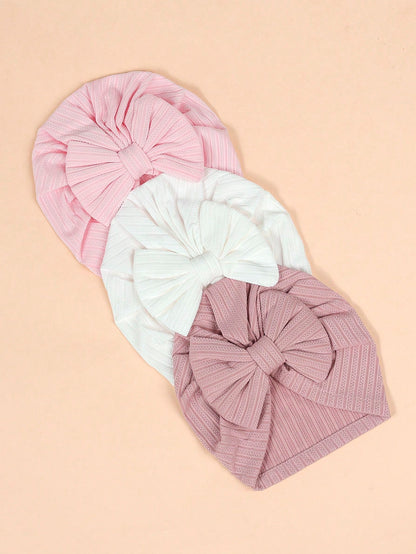 Prenda multicolor gorro turbante para bebe con lazo vista superior
