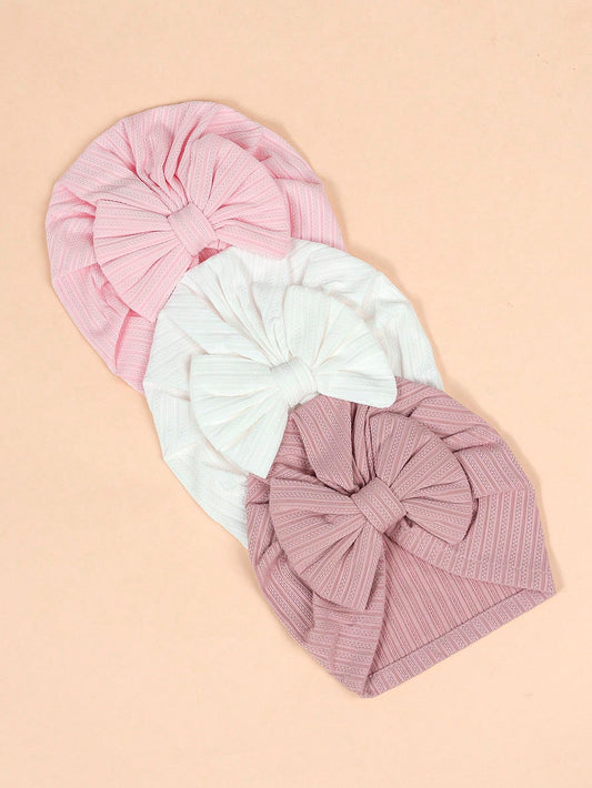 Prenda multicolor gorro turbante para bebe con lazo vista superior
