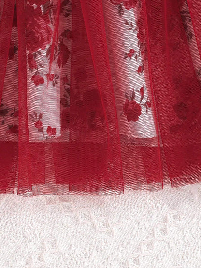 Prenda roja vestido para bebe detalle de tul floral