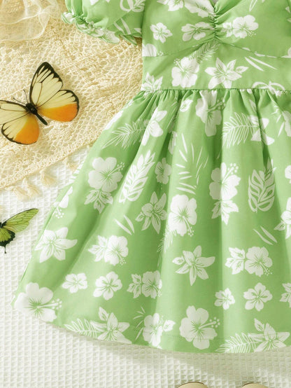 Prenda verde menta vestido para bebe detalle de falda floral