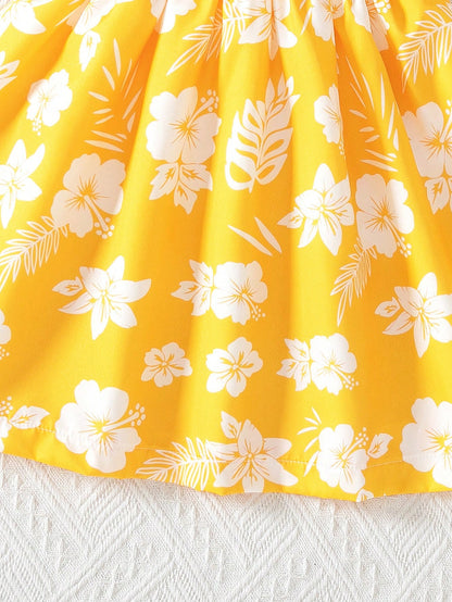 Prenda amarilla vestido floral para bebe detalle del estampado y acabado