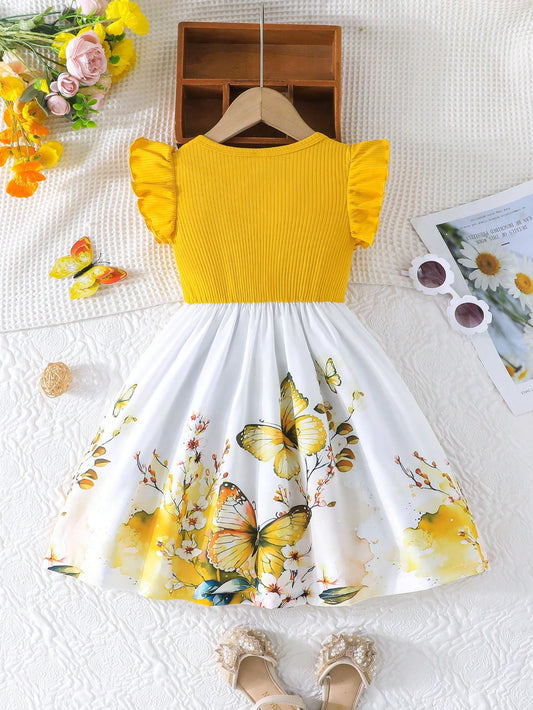 Prenda amarilla vestido para bebe vista trasera con falda estampada
