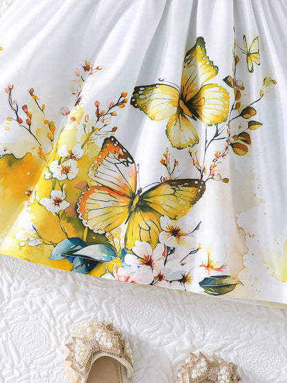 Prenda amarilla vestido para bebe detalle de estampado floral y mariposas