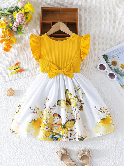 Prenda amarilla vestido para bebe con mariposas y flores vista frontal
